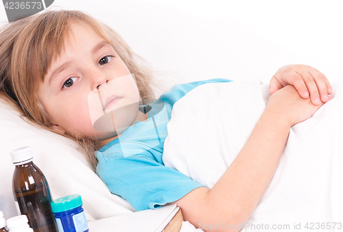 Image of Sick little girl in bed