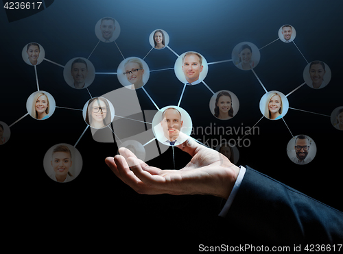 Image of close up of businessman hand with contacts icons