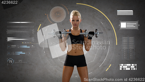 Image of happy young sporty woman exercising with dumbbells