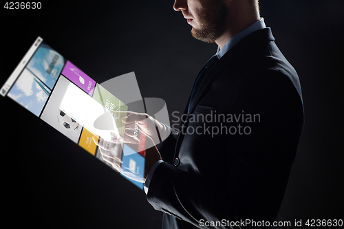 Image of close up of businessman with transparent tablet pc