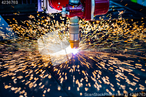 Image of CNC Laser plasma cutting of metal, modern industrial technology.