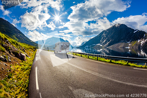 Image of Caravan car travels on the highway.