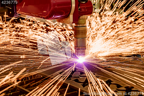 Image of CNC Laser plasma cutting of metal, modern industrial technology.