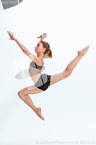 Image of The girl jumping as modern ballet dancer