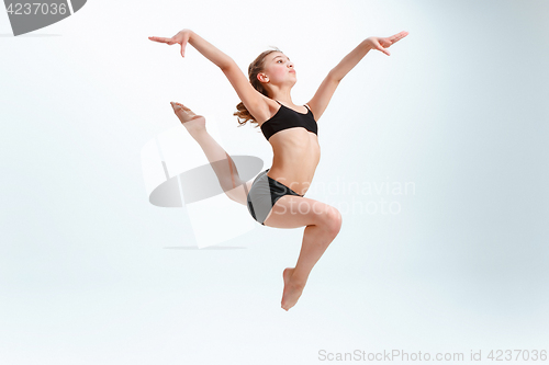 Image of The girl jumping as modern ballet dancer