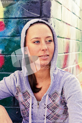 Image of young pretty brunette teenage girl posing friendly outside, lifestyle people concept