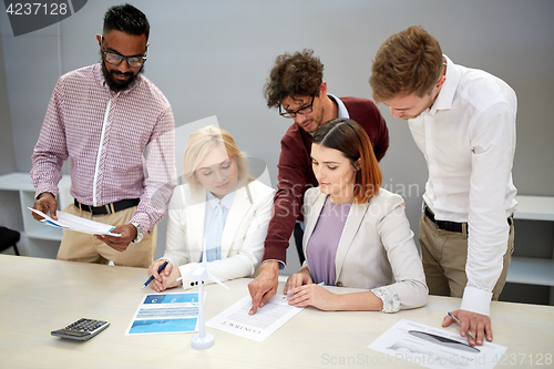 Image of business people discussing green energy project