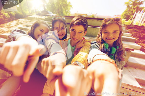 Image of teenage friends or students pointing finger at you