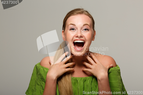 Image of Young woman with open shoulders