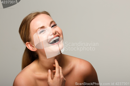 Image of Beautiful woman with bare shoulders