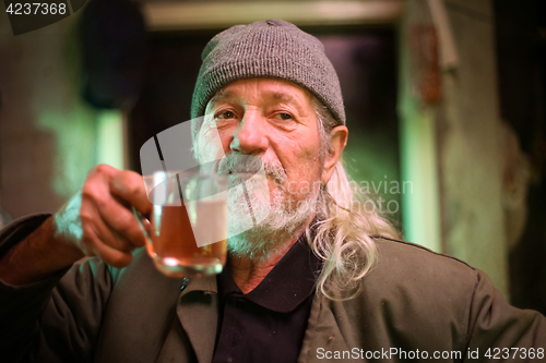 Image of Man with glass of wine