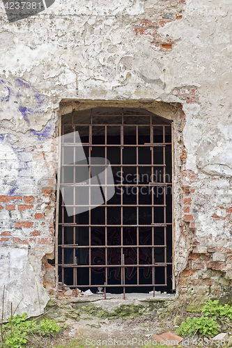 Image of abandoned grunge cracked brick stucco wall