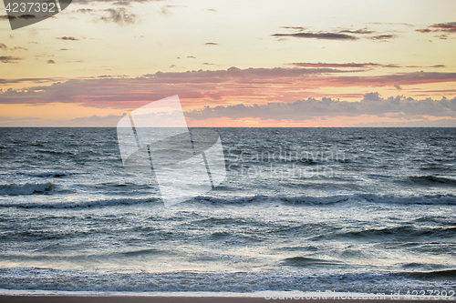 Image of stormy sea and cloudy sky