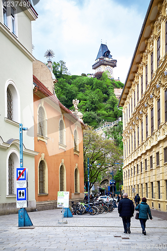 Image of Old clock tower and street view in Graz, Austria