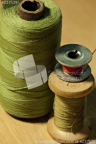 Image of  different sizes coil of thread