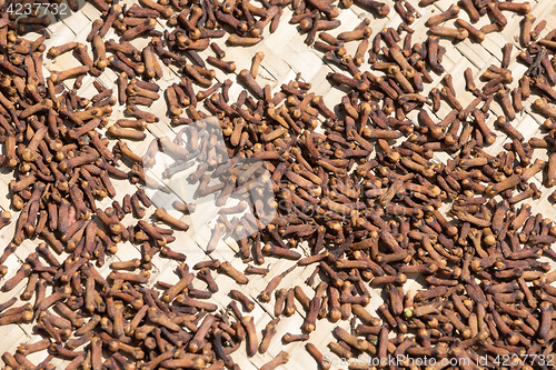 Image of drying flower buds from clove spice