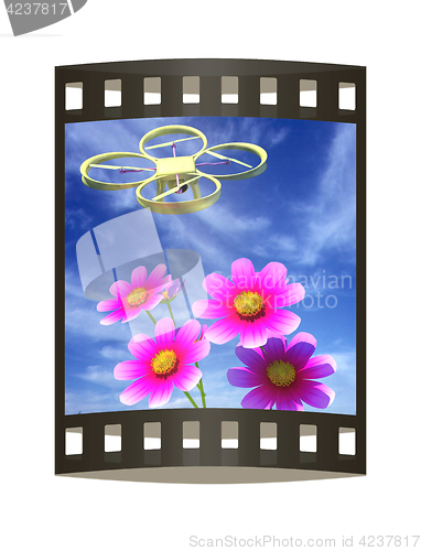 Image of Drone, quadrocopter, with photo camera against the sky and Beaut