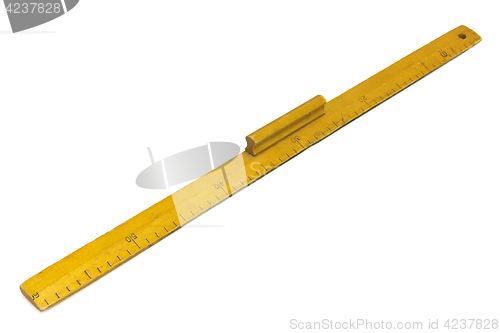 Image of Yellow wooden measuring ruler on a white background