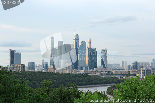 Image of Modern buildings of glass and steel skyscrapers against the sky