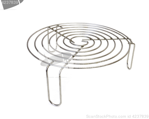 Image of Metal trivet for hot tableware isolated on white background