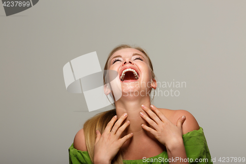 Image of Laughing girl with open shoulders