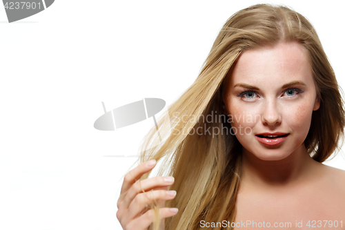 Image of Long-haired girl with bare shoulders