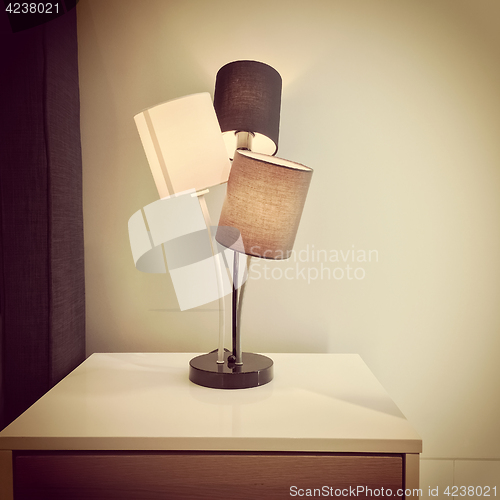 Image of Retro style lamp on a dresser