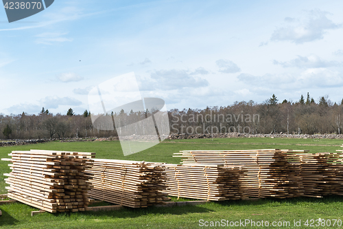Image of Heaps of drying planks