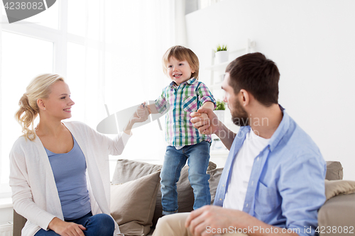 Image of happy family having fun at home