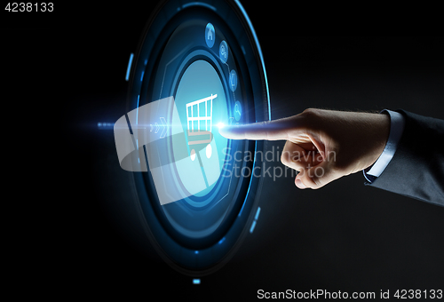 Image of male hand pointing finger to shopping cart icon