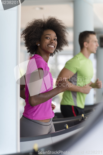 Image of people exercisinng a cardio on treadmill