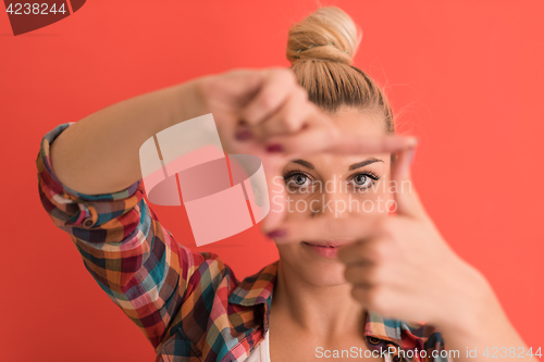 Image of young woman over color background