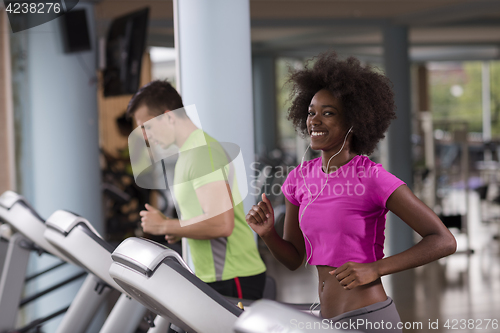 Image of people exercisinng a cardio on treadmill