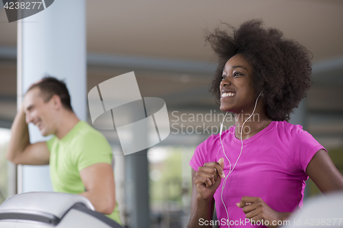 Image of people exercisinng a cardio on treadmill