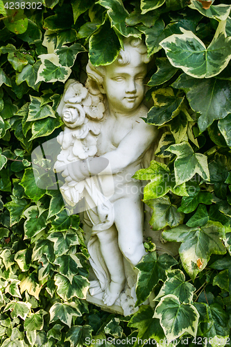 Image of Statue with Leaves