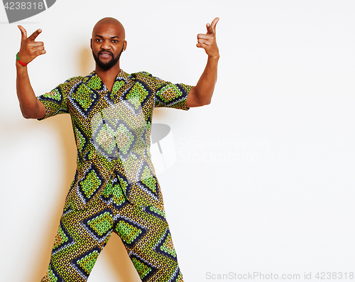 Image of portrait of young handsome african man wearing bright green nati