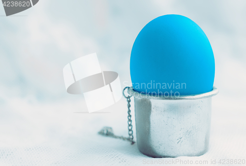 Image of Blue Egg In A Silver Stand