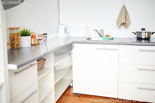 Image of modern home kitchen interior with food on table