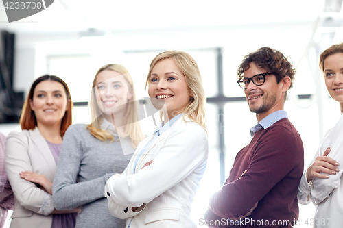 Image of happy business team in office