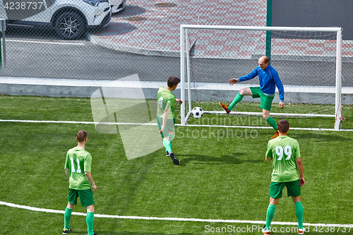 Image of Soccer football goalkeeper making diving save