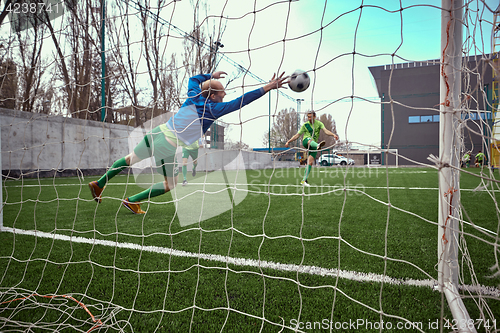 Image of Soccer football goalkeeper making diving save