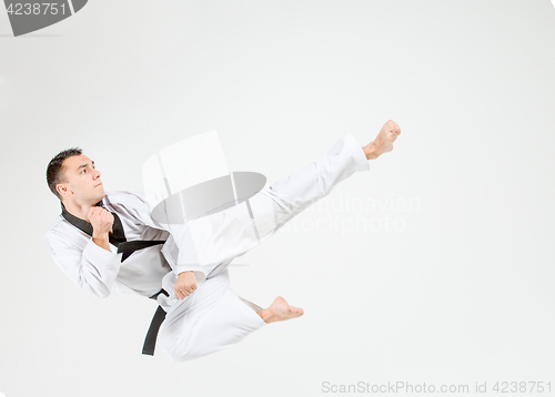 Image of The karate man with black belt