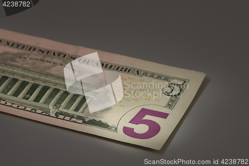 Image of number 5 on american dollar bill