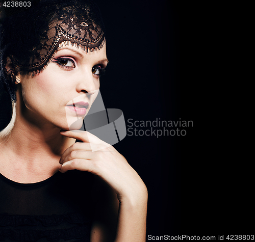 Image of beauty blond woman in studio on black background, stylish fashio