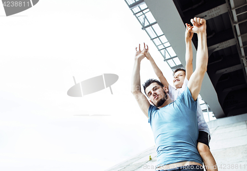 Image of mature father with his son under the bridge having fun together happy family, lifestyle people concept 