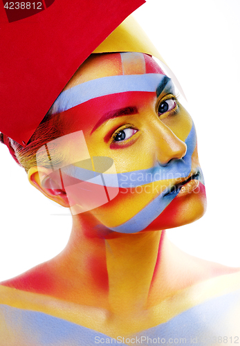 Image of woman with creative geometry make up, red, yellow, blue closeup 