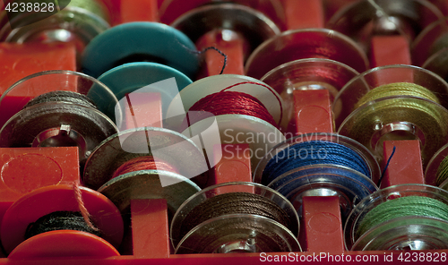 Image of  Boxes with tailor bobbins