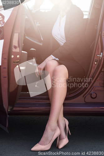 Image of Woman in a car