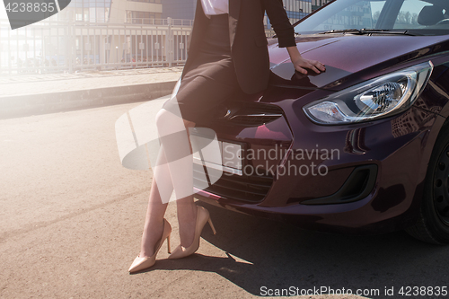 Image of Woman in a car