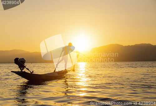Image of Fisherman of Lake in action when fishing